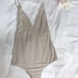 Beige suede body suit (small)
